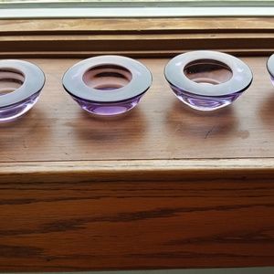 Glass votive candle holders.